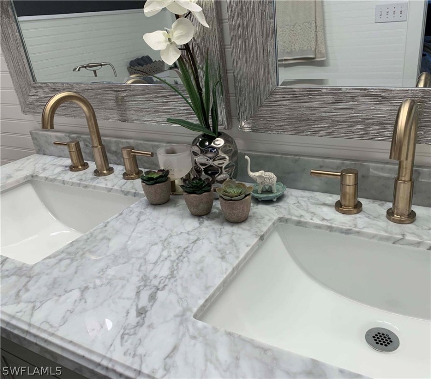 8382 Trillium Road Fort Myers, FL 33967 - Photo 8 of 19 a bathroom with a sink
