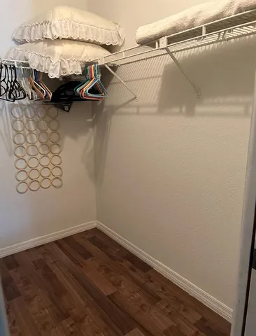 a view of a room with rack on the wall