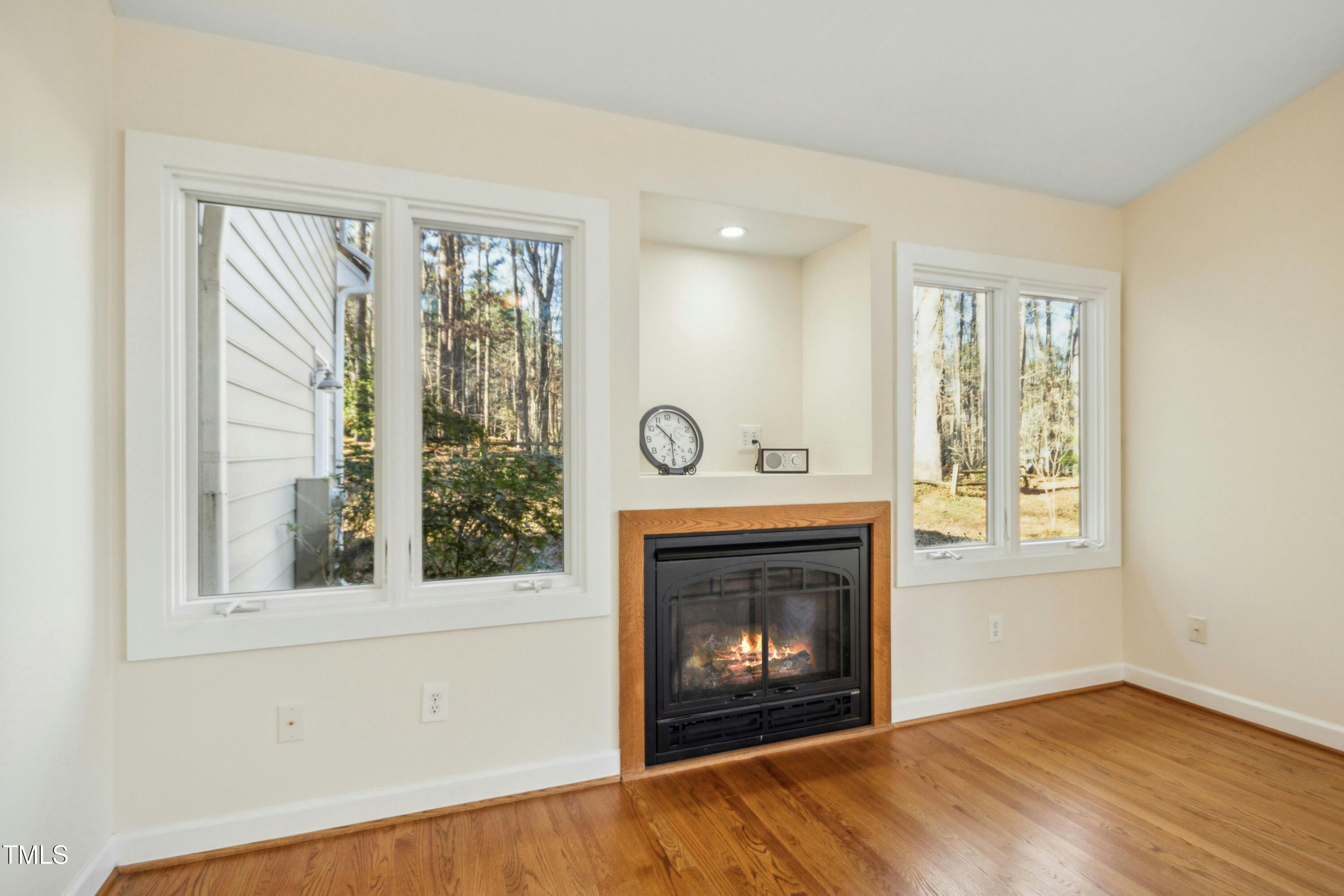 8808 Limestone Court Raleigh, NC 27615 - Photo 13 of 64 Gas Logs in Sun Room