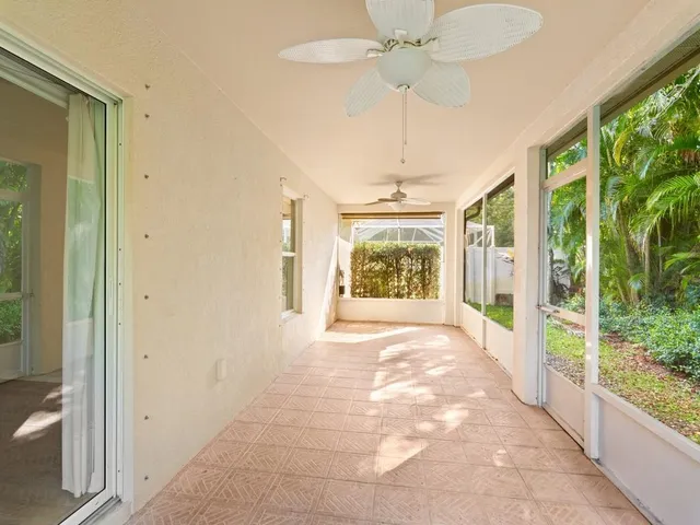 a view of a porch and garden