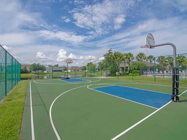 a view of an outdoor space and tennis court