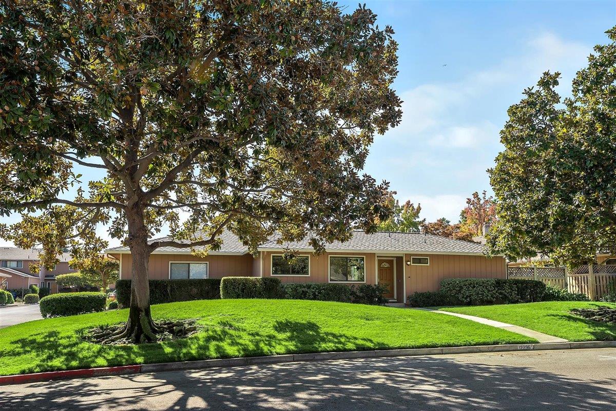12296 Atrium Circle Saratoga, CA 95070 - Photo 1 of 34 a front view of a house with a garden
