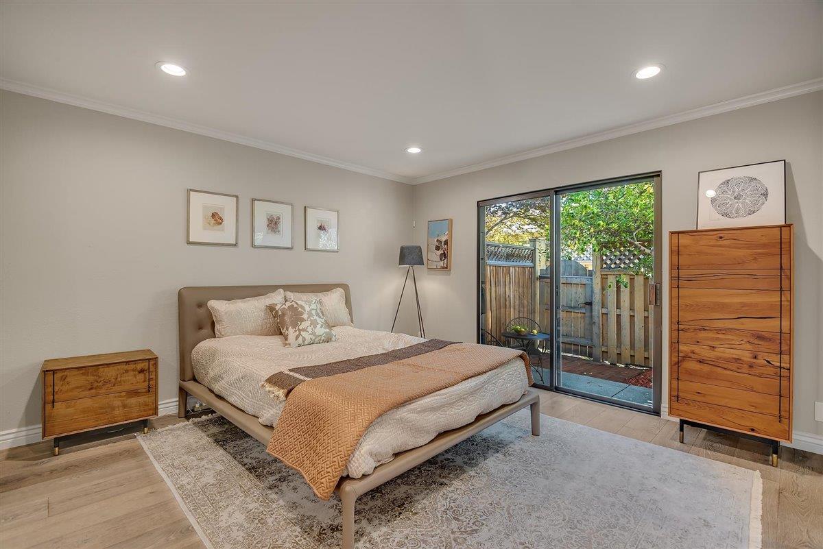 12296 Atrium Circle Saratoga, CA 95070 - Photo 17 of 34 a bedroom with a large bed and a window