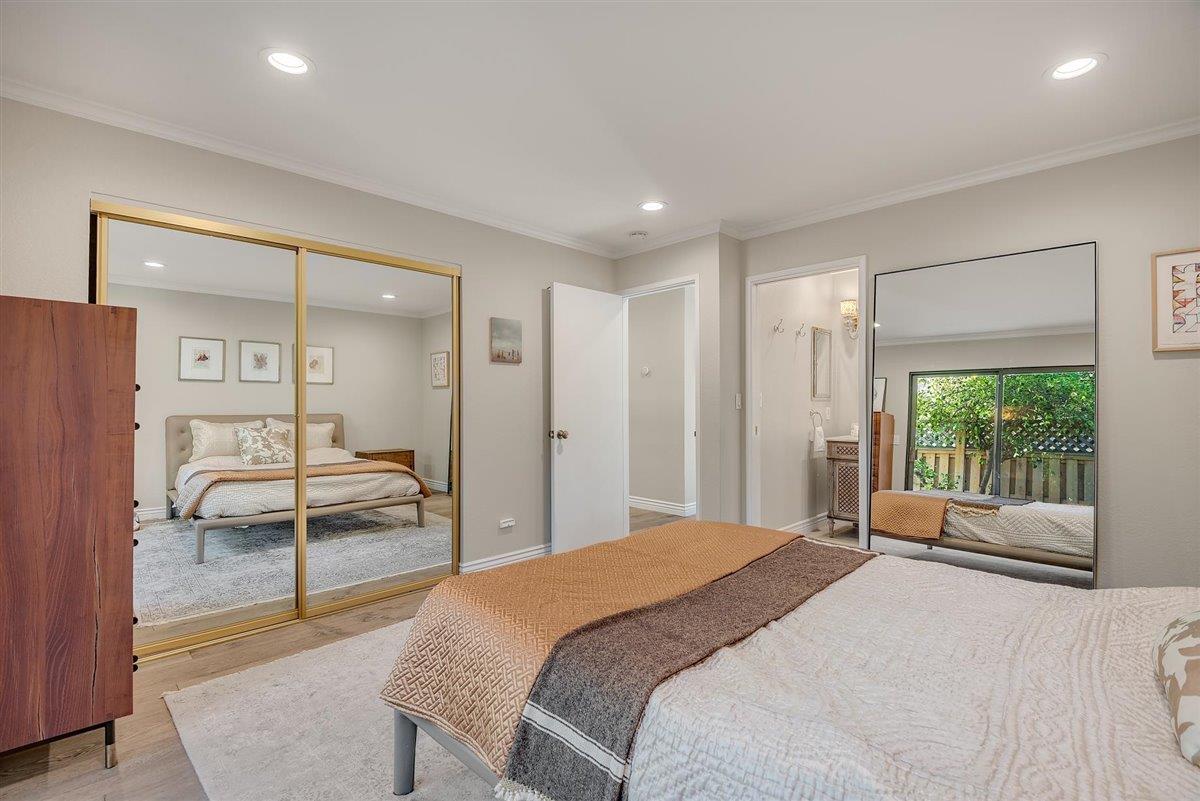12296 Atrium Circle Saratoga, CA 95070 - Photo 18 of 34 a bedroom with a bed and a large window