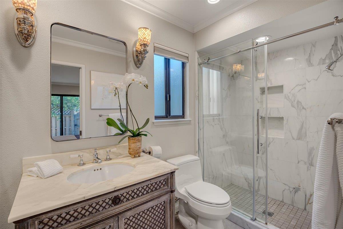 12296 Atrium Circle Saratoga, CA 95070 - Photo 19 of 34 a bathroom with a sink toilet and shower