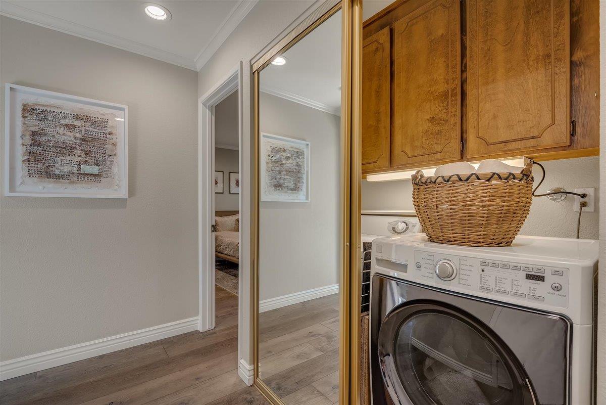 12296 Atrium Circle Saratoga, CA 95070 - Photo 23 of 34 a room with a fireplace and a rug