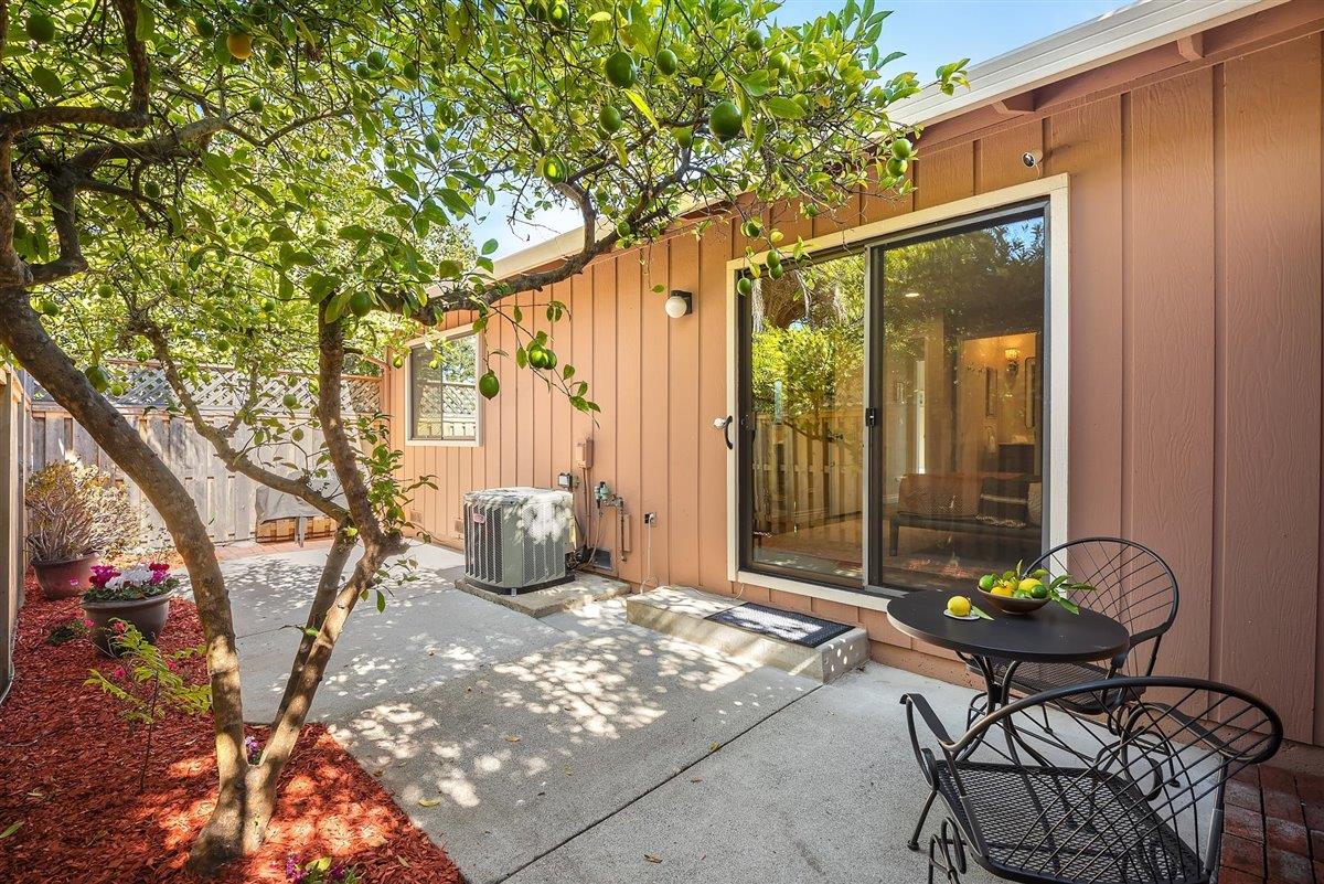 12296 Atrium Circle Saratoga, CA 95070 - Photo 24 of 34 a view of a chairs and table in a backyard