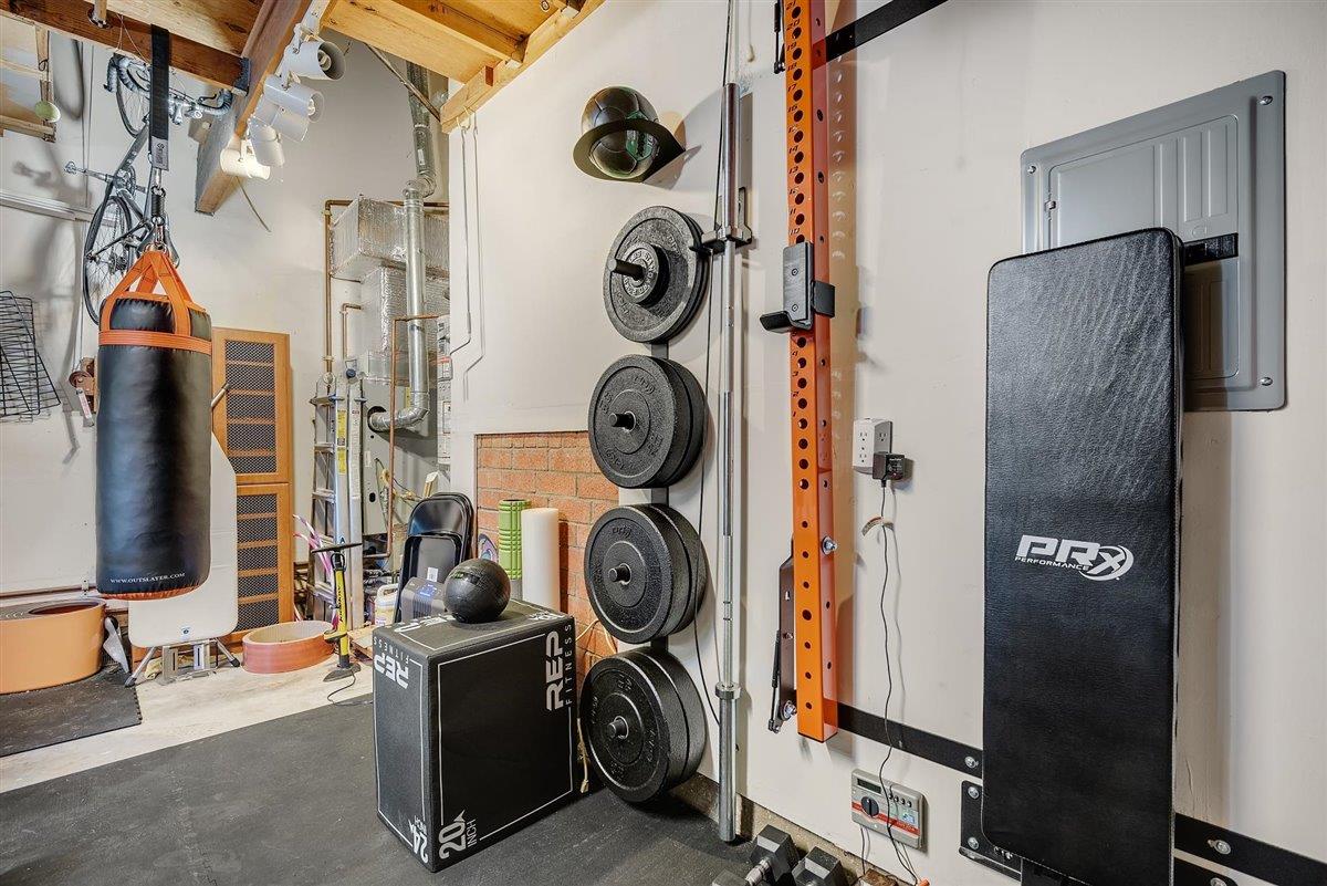 12296 Atrium Circle Saratoga, CA 95070 - Photo 27 of 34 a view of storage and utility room with washer and dryer