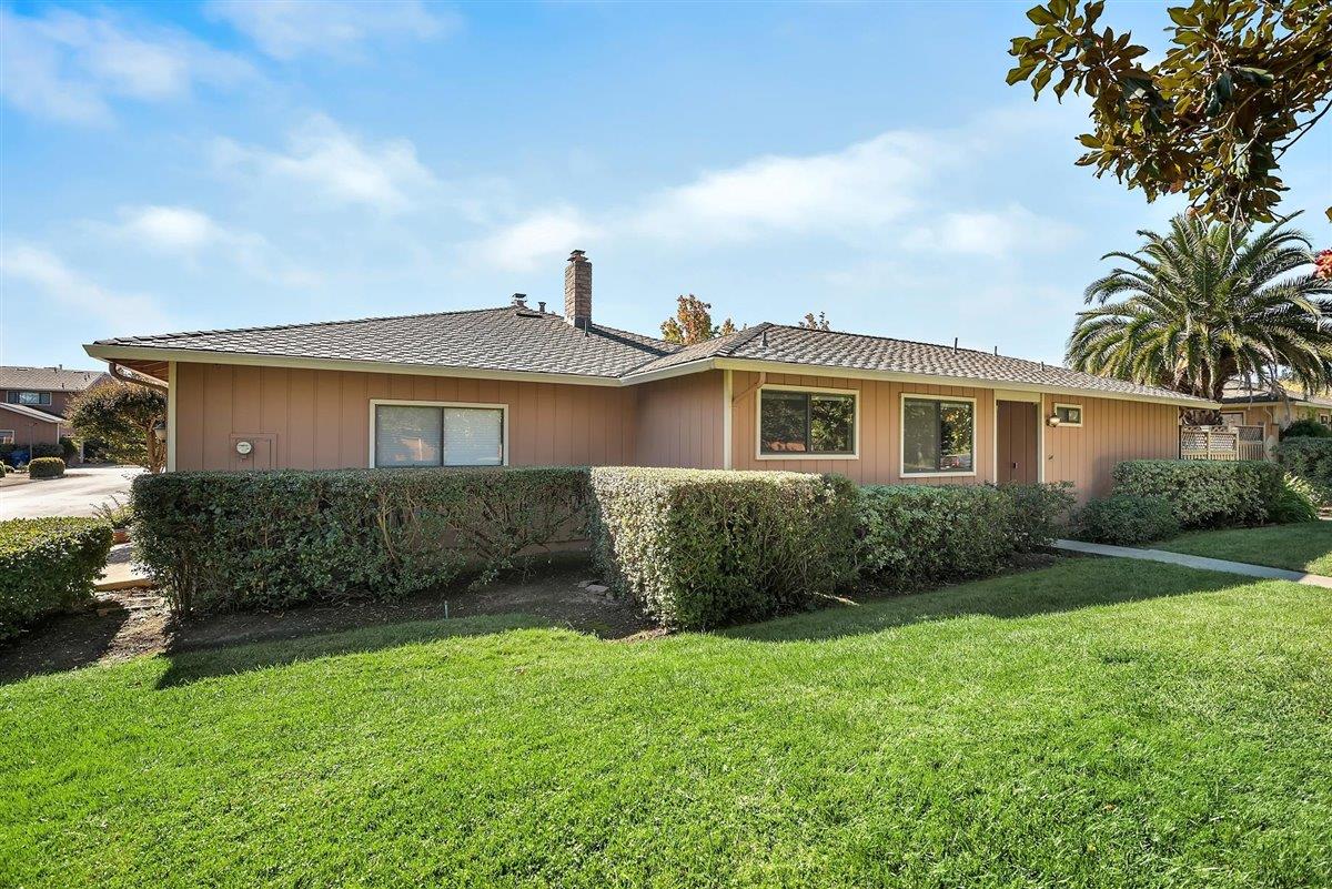 12296 Atrium Circle Saratoga, CA 95070 - Photo 28 of 34 a front view of a house with a garden