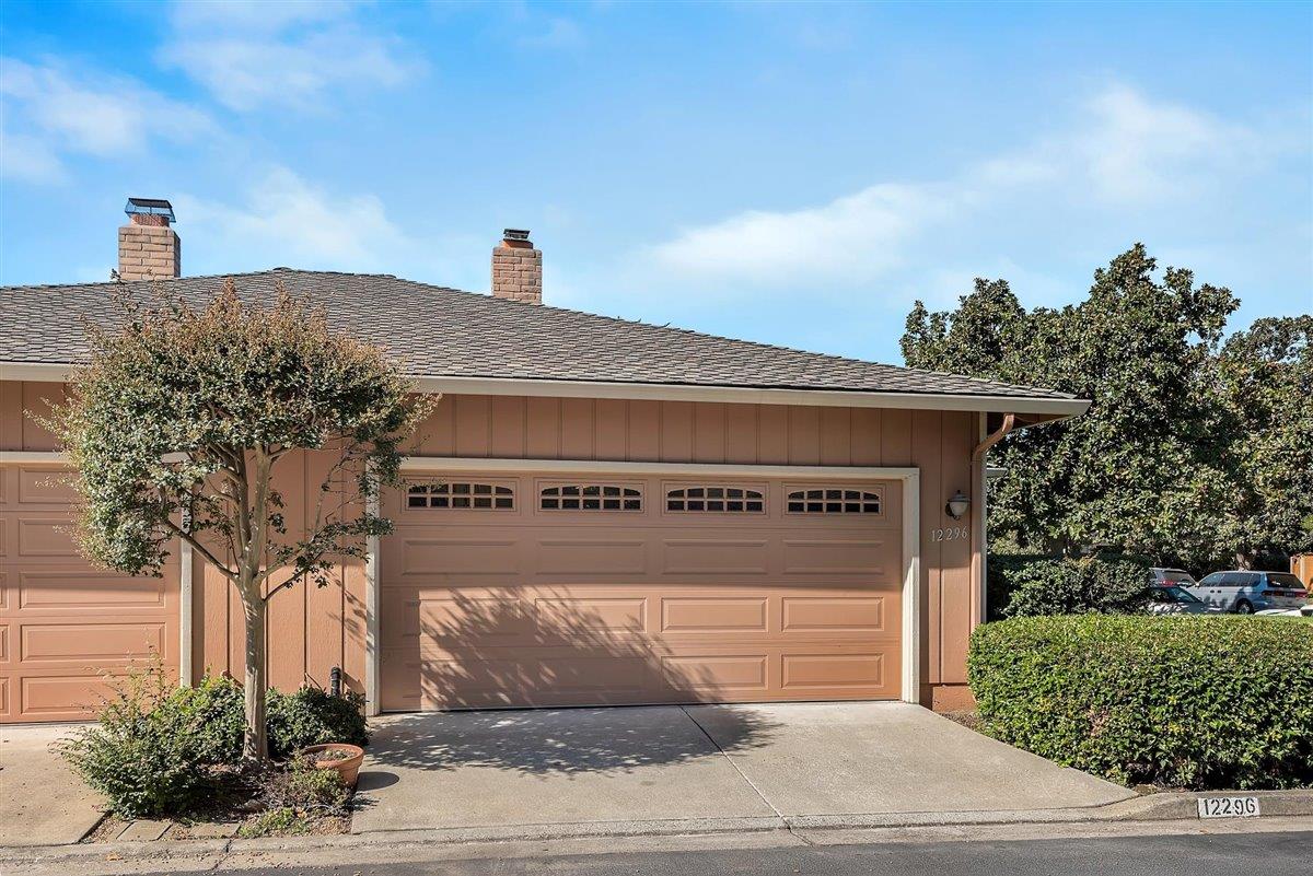12296 Atrium Circle Saratoga, CA 95070 - Photo 30 of 34 a front view of a house with a yard