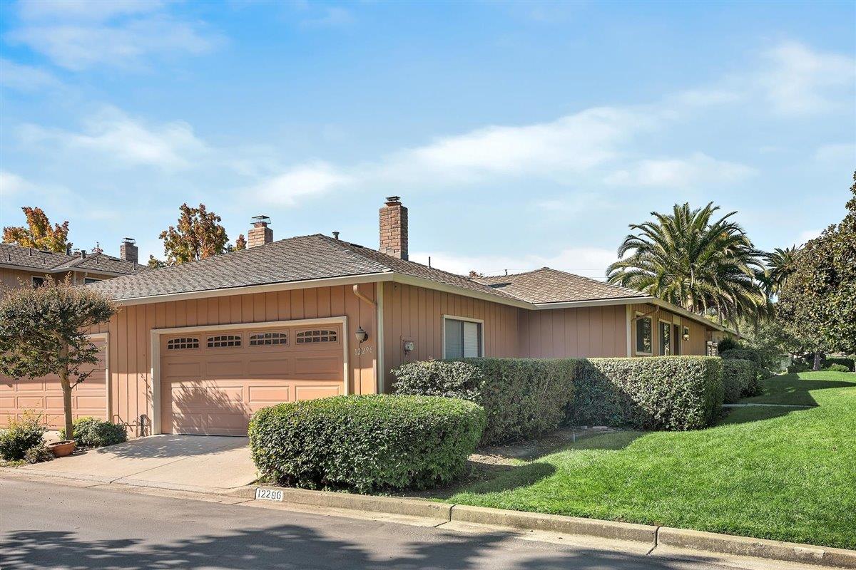 12296 Atrium Circle Saratoga, CA 95070 - Photo 31 of 34 a front view of a house with a yard