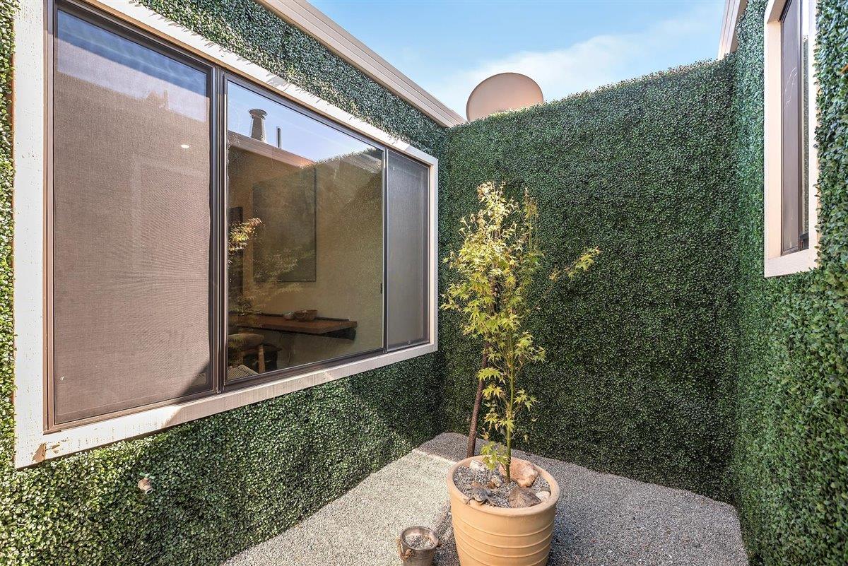 12296 Atrium Circle Saratoga, CA 95070 - Photo 8 of 34 a outdoor space with a swing chair and potted plant