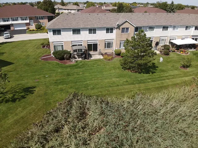 a aerial view of a house with garden