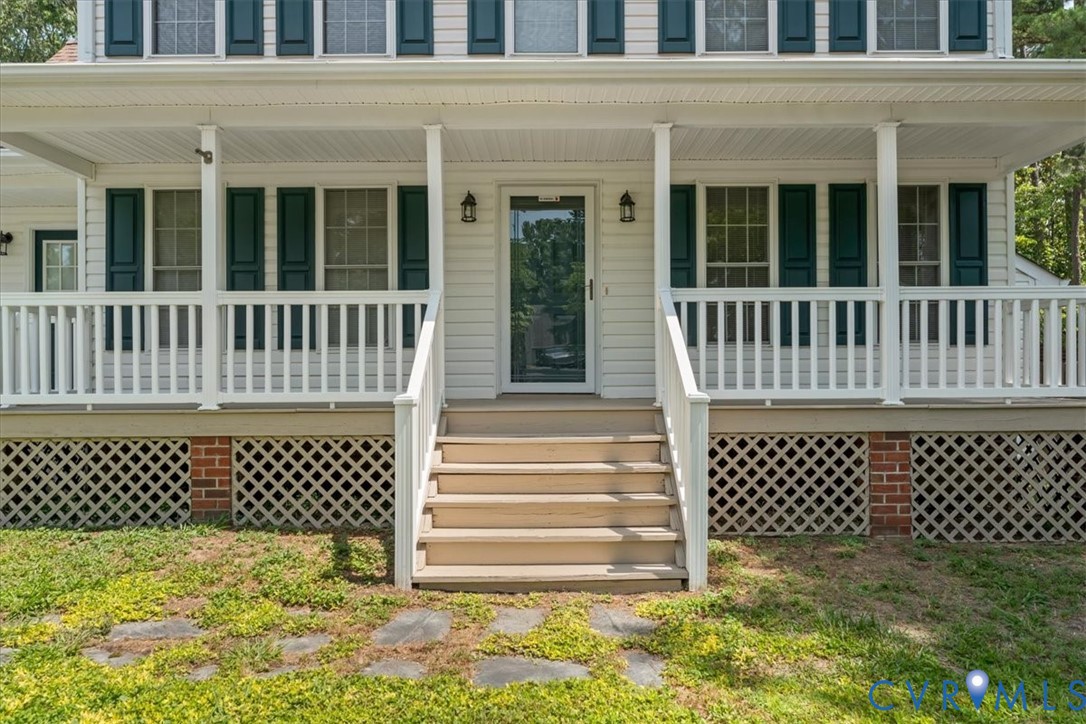 2924 Warfield Ridge Terrace Chester, VA 23831 - Photo 7 of 38 Front elevation featuring a full-width porch with