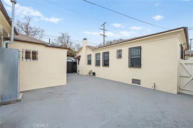 a view of a house with a street