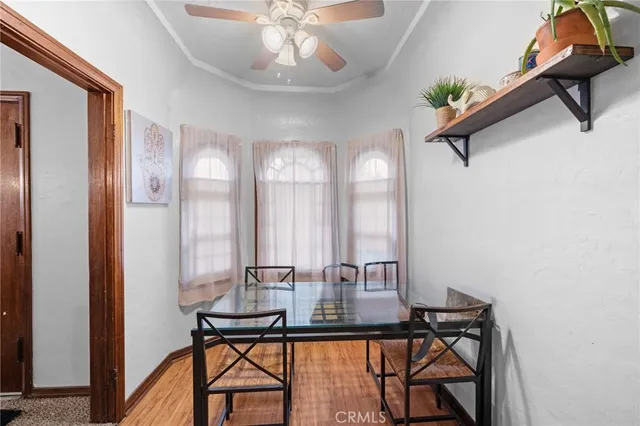 a view of a livingroom with furniture and windows