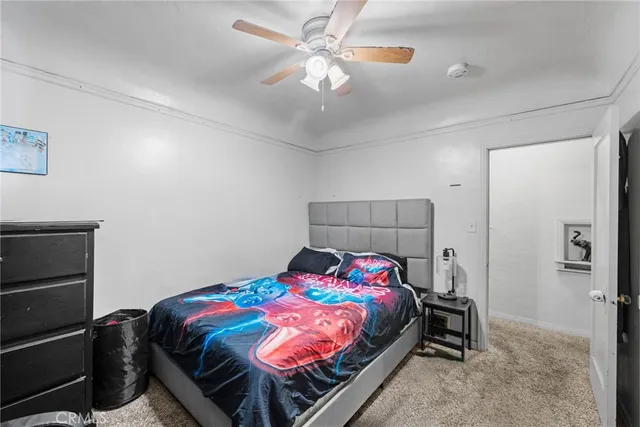 a bedroom with a bed and a closet