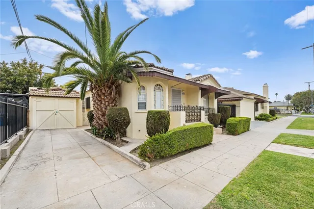 a view of a hallway with paintings on the wall