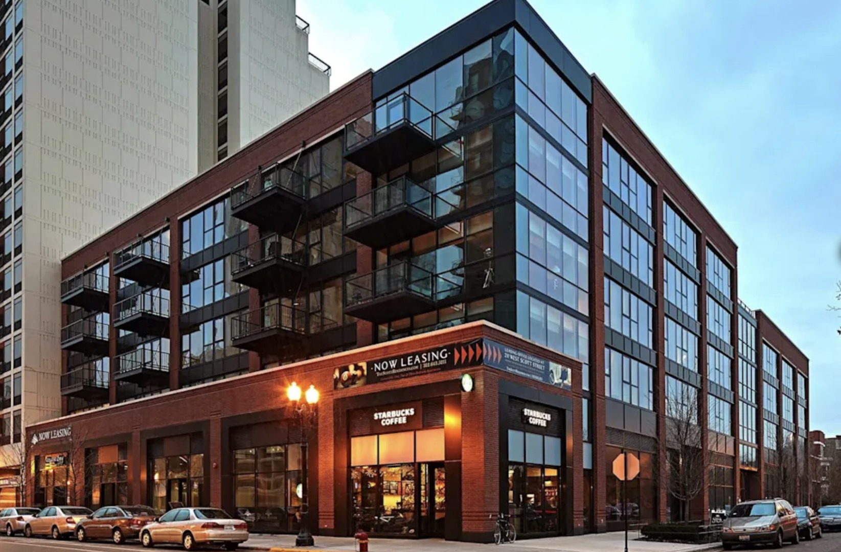 a view of a building with a street