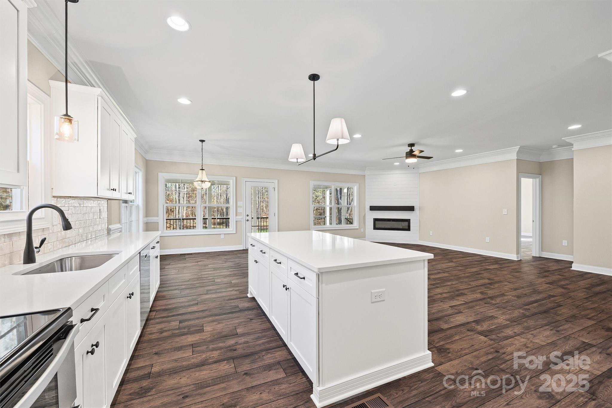 3812 Winter Road, Unit 5 Rock Hill, SC 29730 - Photo 17 of 37 a large white kitchen with sink and cabinets
