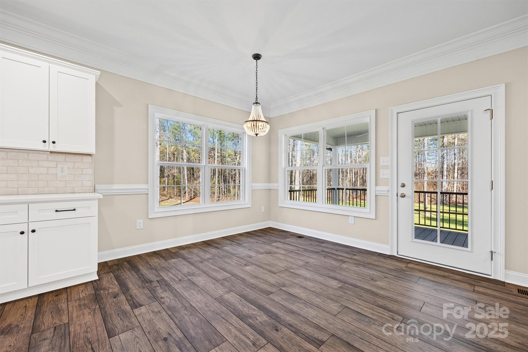 3812 Winter Road, Unit 5 Rock Hill, SC 29730 - Photo 18 of 37 a view of an empty room with a window and wooden floor