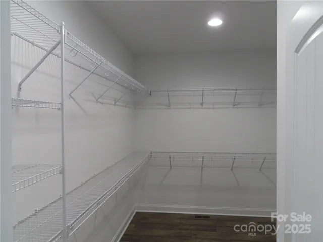 a bathroom with a shower and toilet