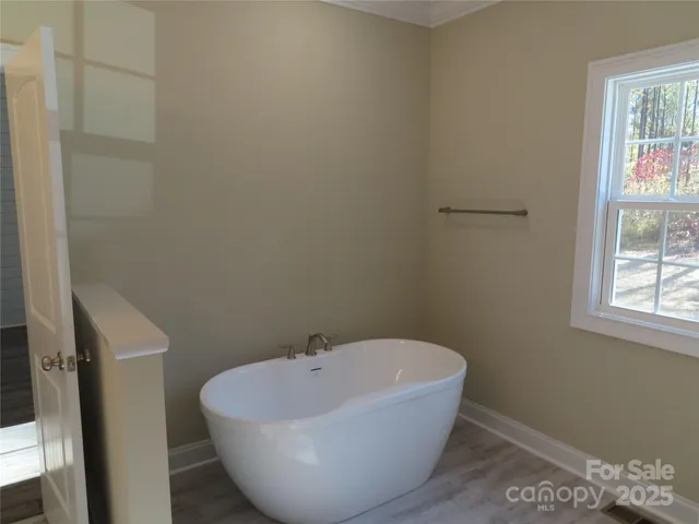 a bathroom with a mirror sink and vanity