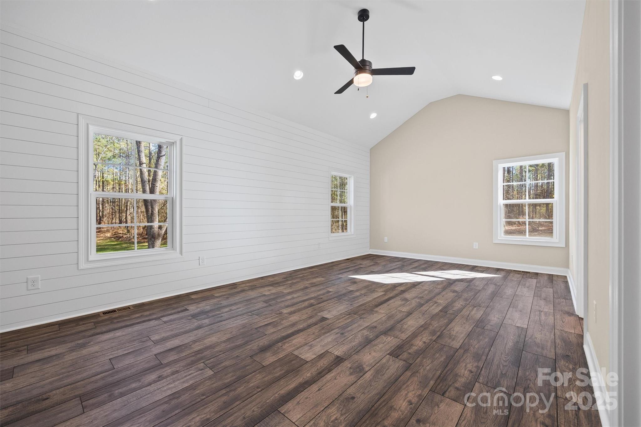 3812 Winter Road, Unit 5 Rock Hill, SC 29730 - Photo 21 of 37 an empty room with wooden floor chandelier and windows