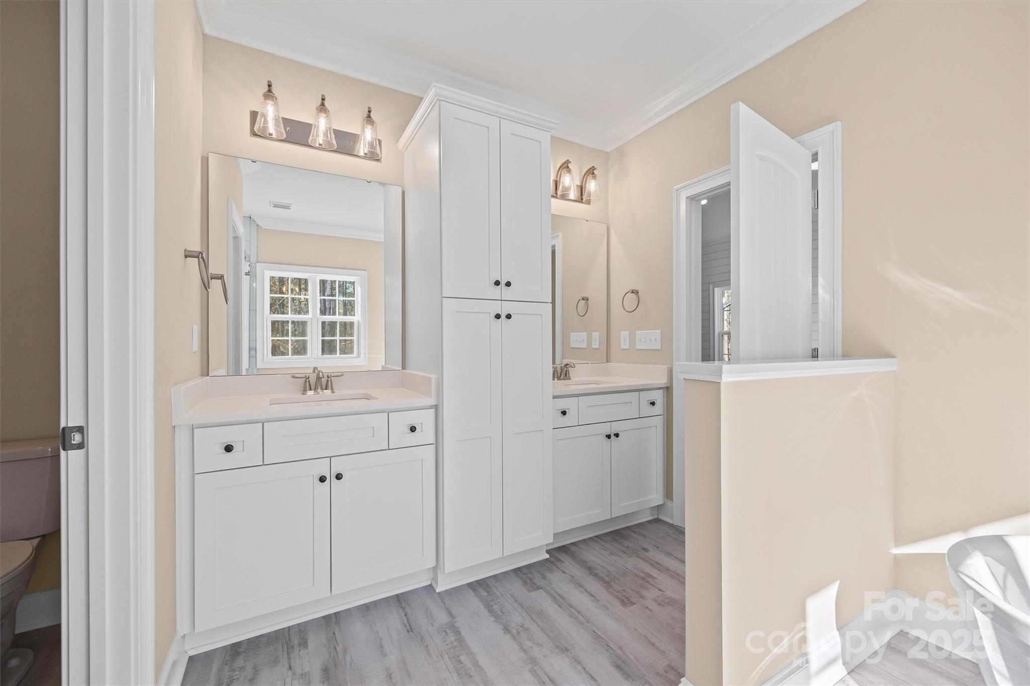 3812 Winter Road, Unit 5 Rock Hill, SC 29730 - Photo 24 of 37 a spacious bathroom with a double vanity sink a mirror and a shower