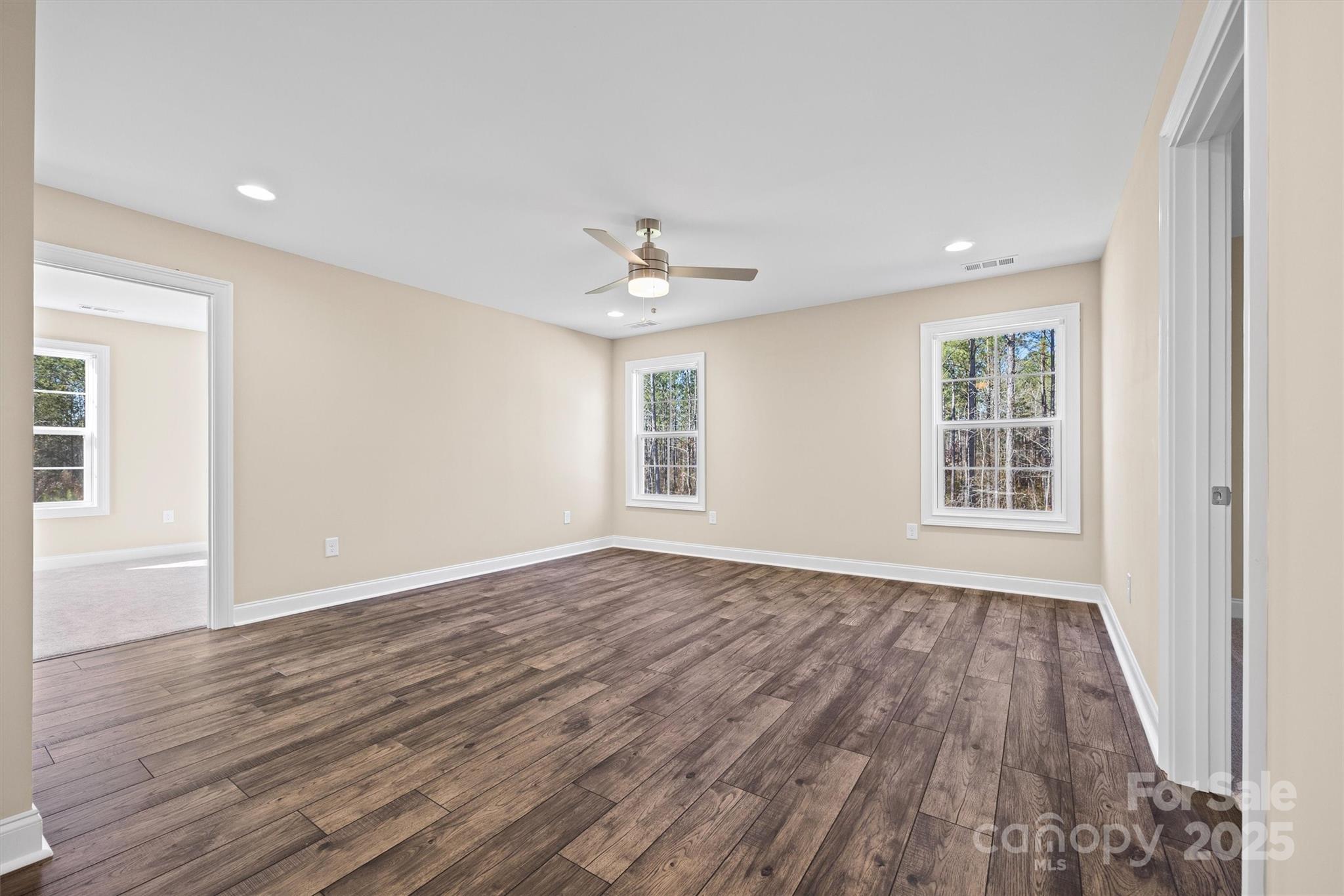 3812 Winter Road, Unit 5 Rock Hill, SC 29730 - Photo 29 of 37 a view of an empty room with wooden floor and a window