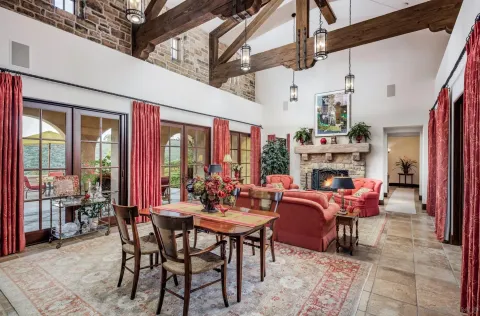 a view of a dining room with furniture window and outside view