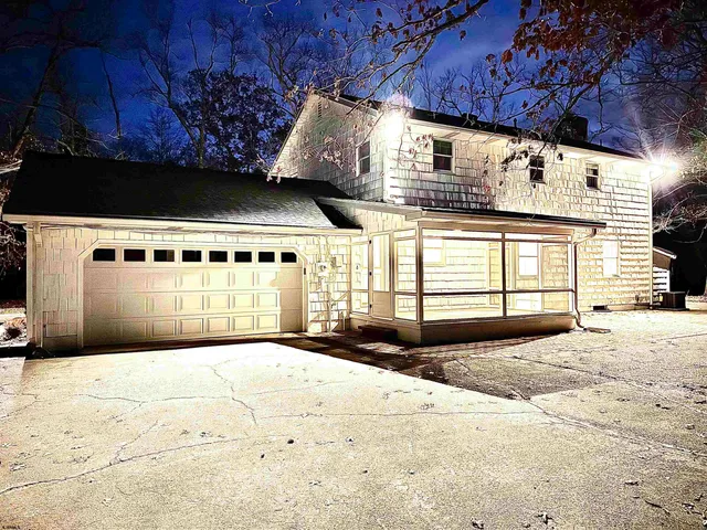 a view of swimming pool from a yard