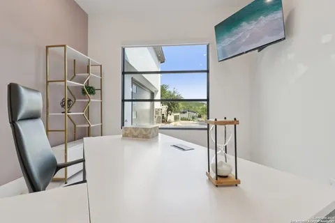 a swimming pool with outdoor seating