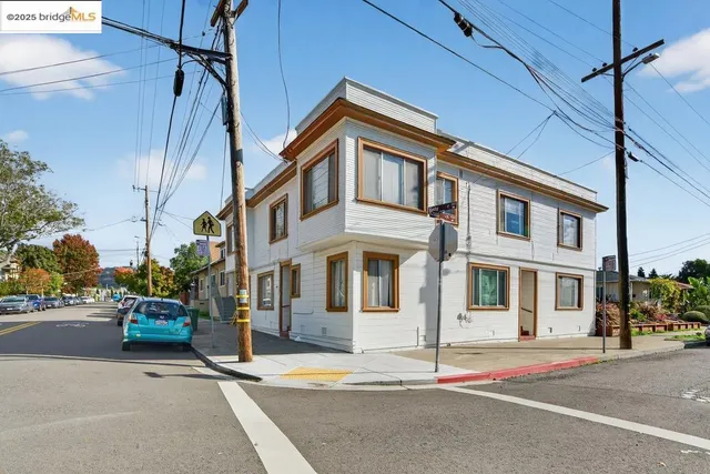 a front view of a building with street view