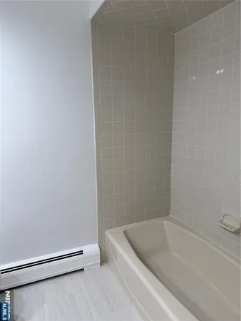 a bathroom with a bathtub