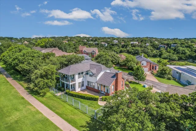 an aerial view of a house with a garden