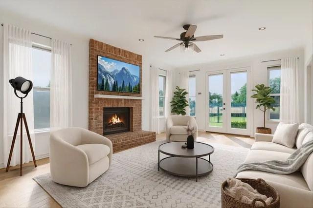 a living room with furniture and a fireplace