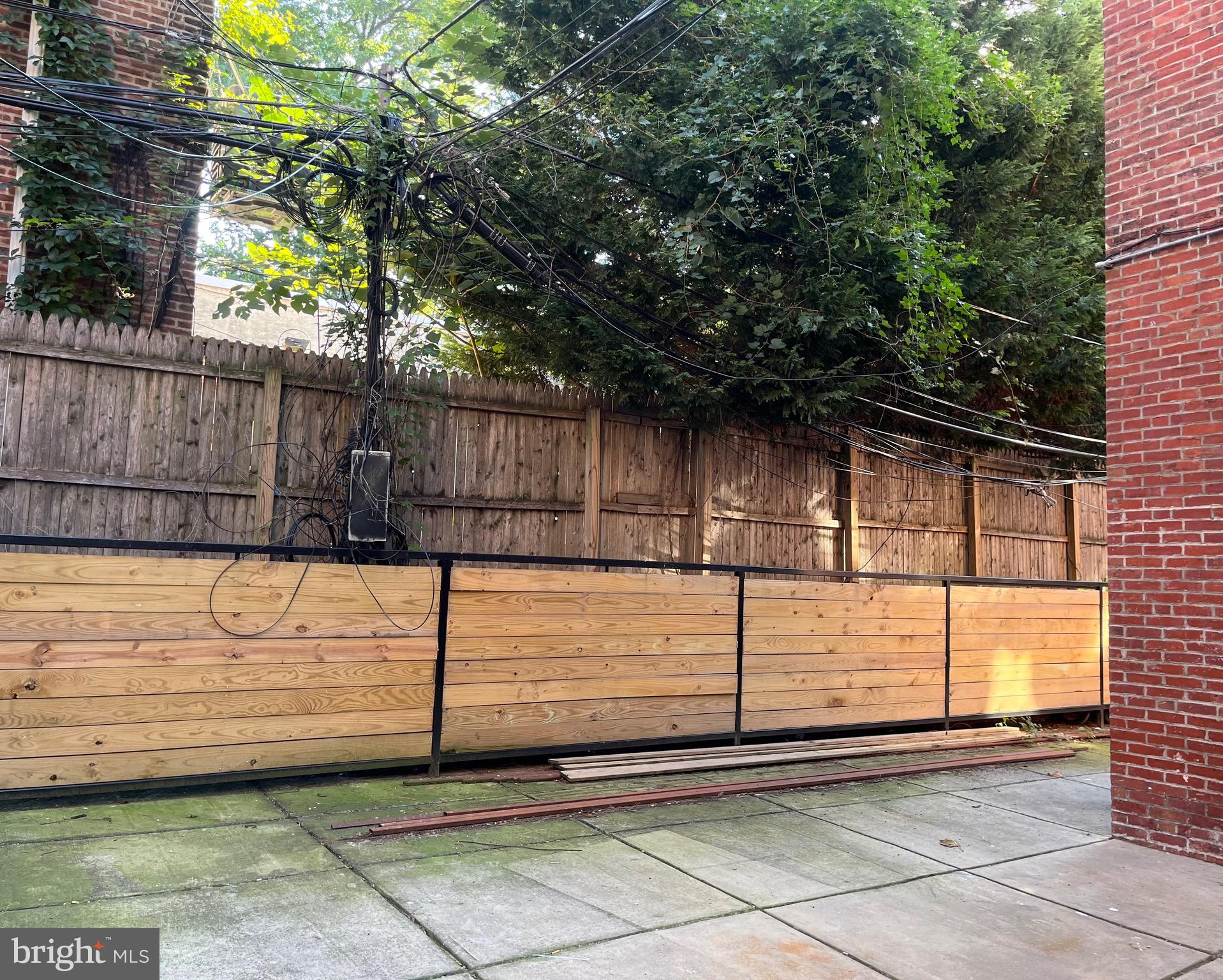 4508 Walnut Street, Unit 402 Philadelphia, PA 19139 - Photo 10 of 14 a view of a fence