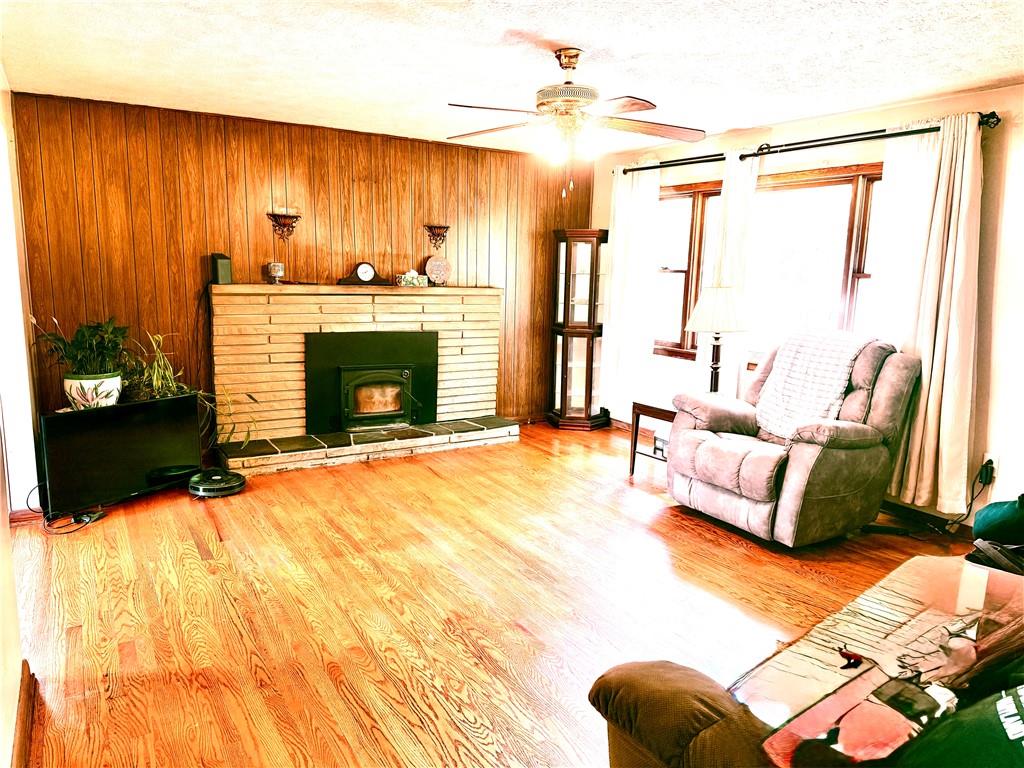 481 Enon Road Enon Valley, PA 16120 - Photo 2 of 33 Living Room - hardwood floors -stone fireplace