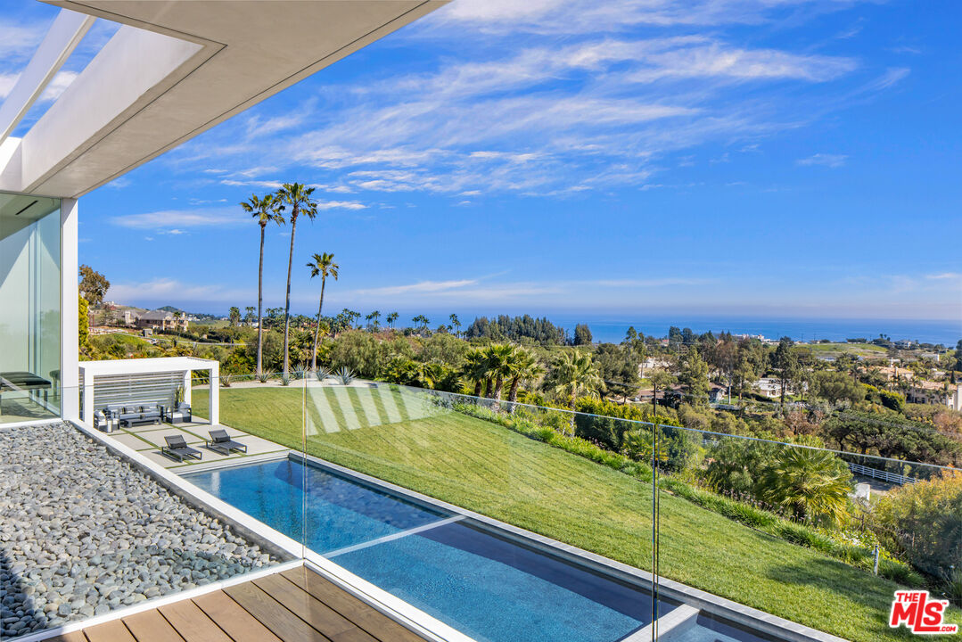 5601 Kanan Dume Road Malibu, CA 90265 - Photo 21 of 31 a view of a balcony with an ocean