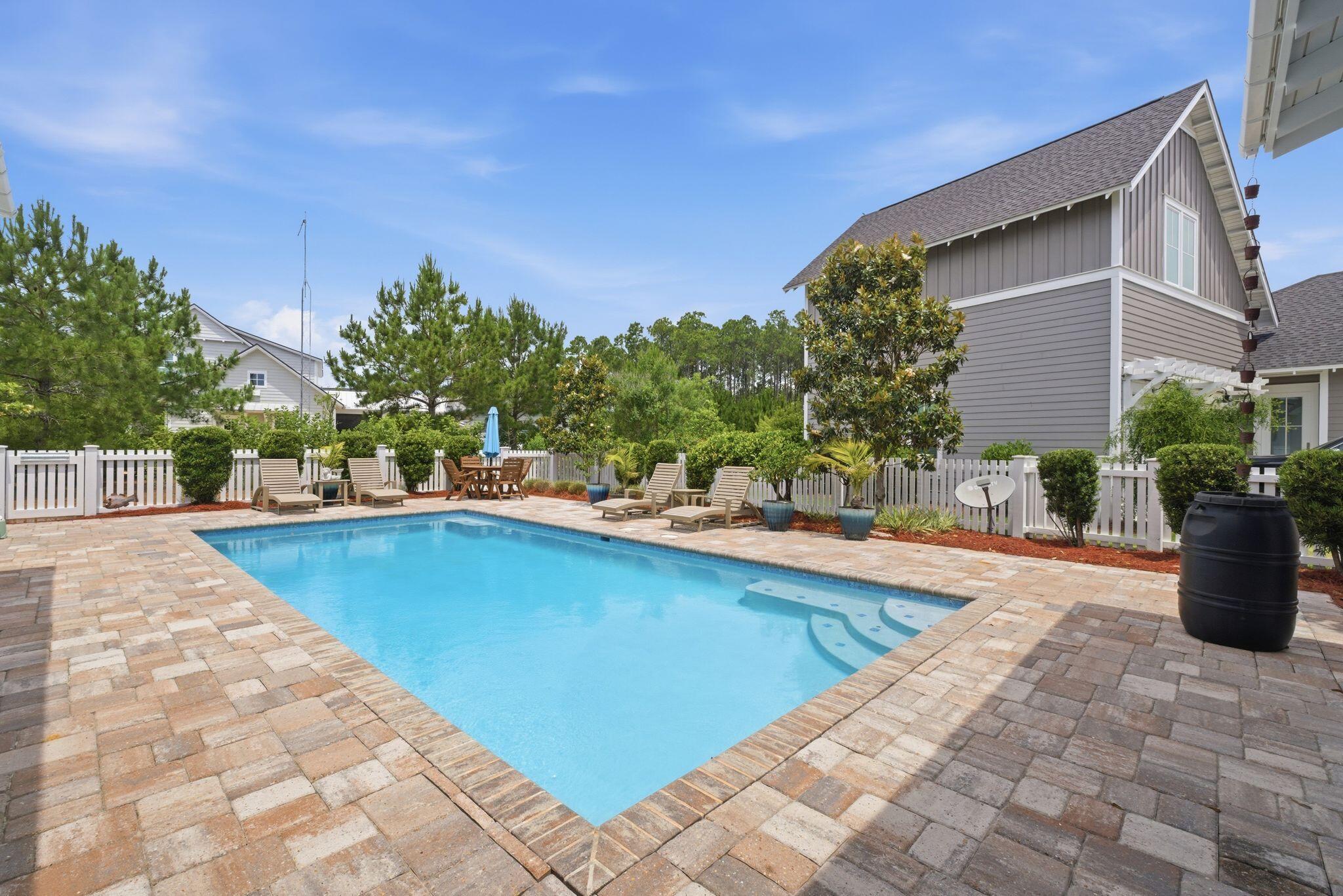 133 Sandchase Circle, Unit LOT 15 Inlet Beach, FL 32461 - Photo 33 of 47 a view of a swimming pool with a patio