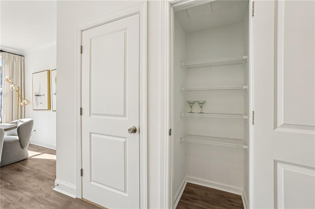 532 Alice Way, Unit D8 Cumming, GA 30040 - Photo 19 of 40 a view of a bathroom from the hallway