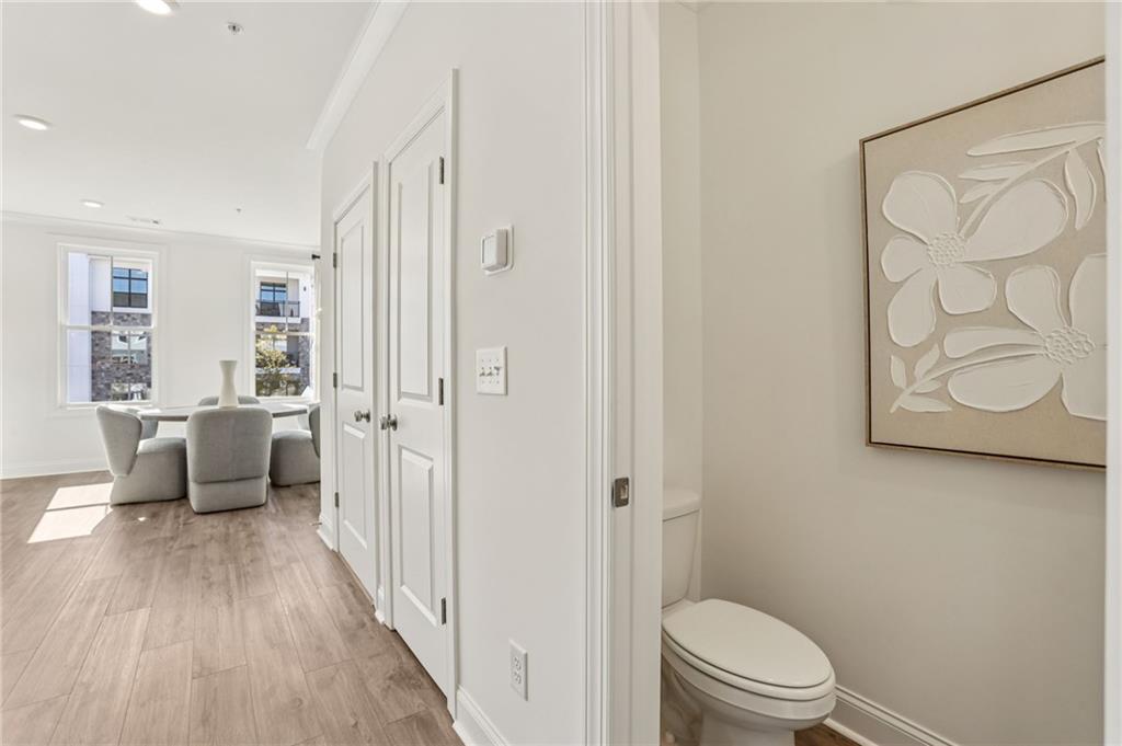 532 Alice Way, Unit D8 Cumming, GA 30040 - Photo 20 of 40 a bathroom with a toilet and a shower