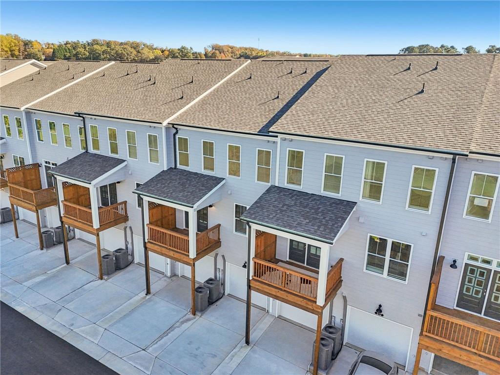 532 Alice Way, Unit D8 Cumming, GA 30040 - Photo 36 of 40 a aerial view of a house with a yard
