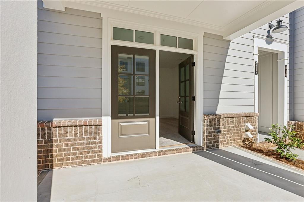 532 Alice Way, Unit D8 Cumming, GA 30040 - Photo 8 of 40 a view of entrance door of the house