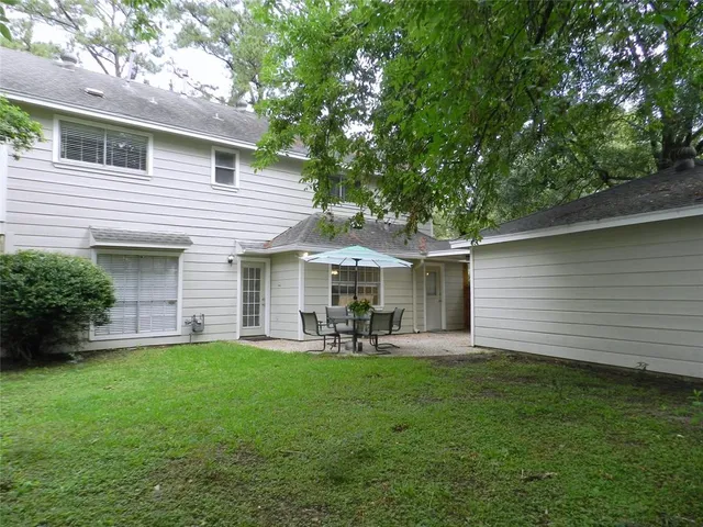 a front view of house with yard and seating area