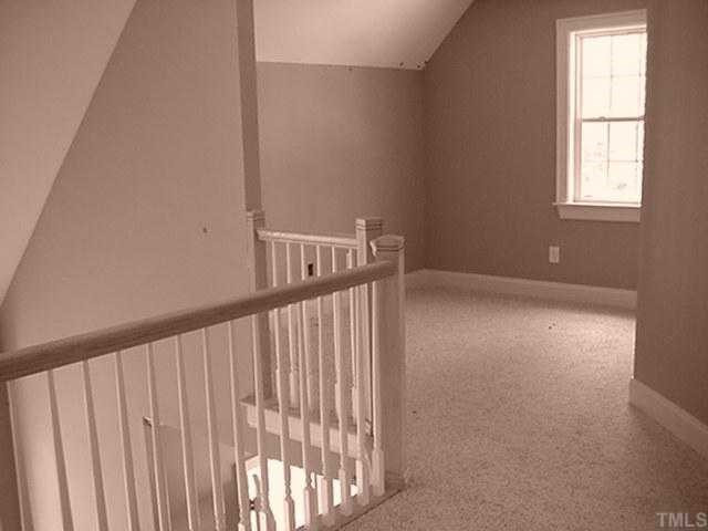 39 High Ridge Court Willow Spring, NC 27592 - Photo 5 of 8 Loft with overlook into family room and foyer.