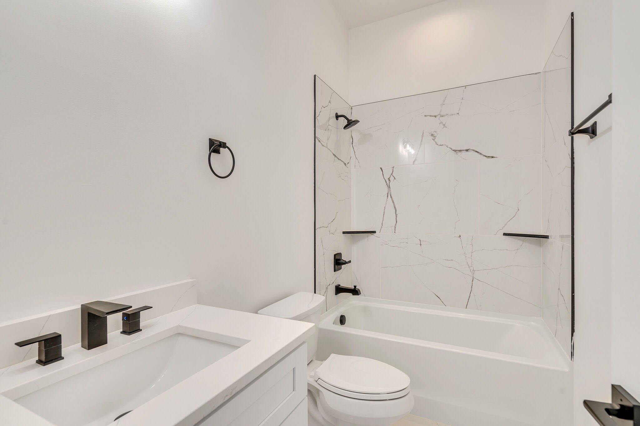 6203 A Morrow Road Nashville, TN 37209 - Photo 6 of 18 a bathroom with a sink toilet a shower and bathtub