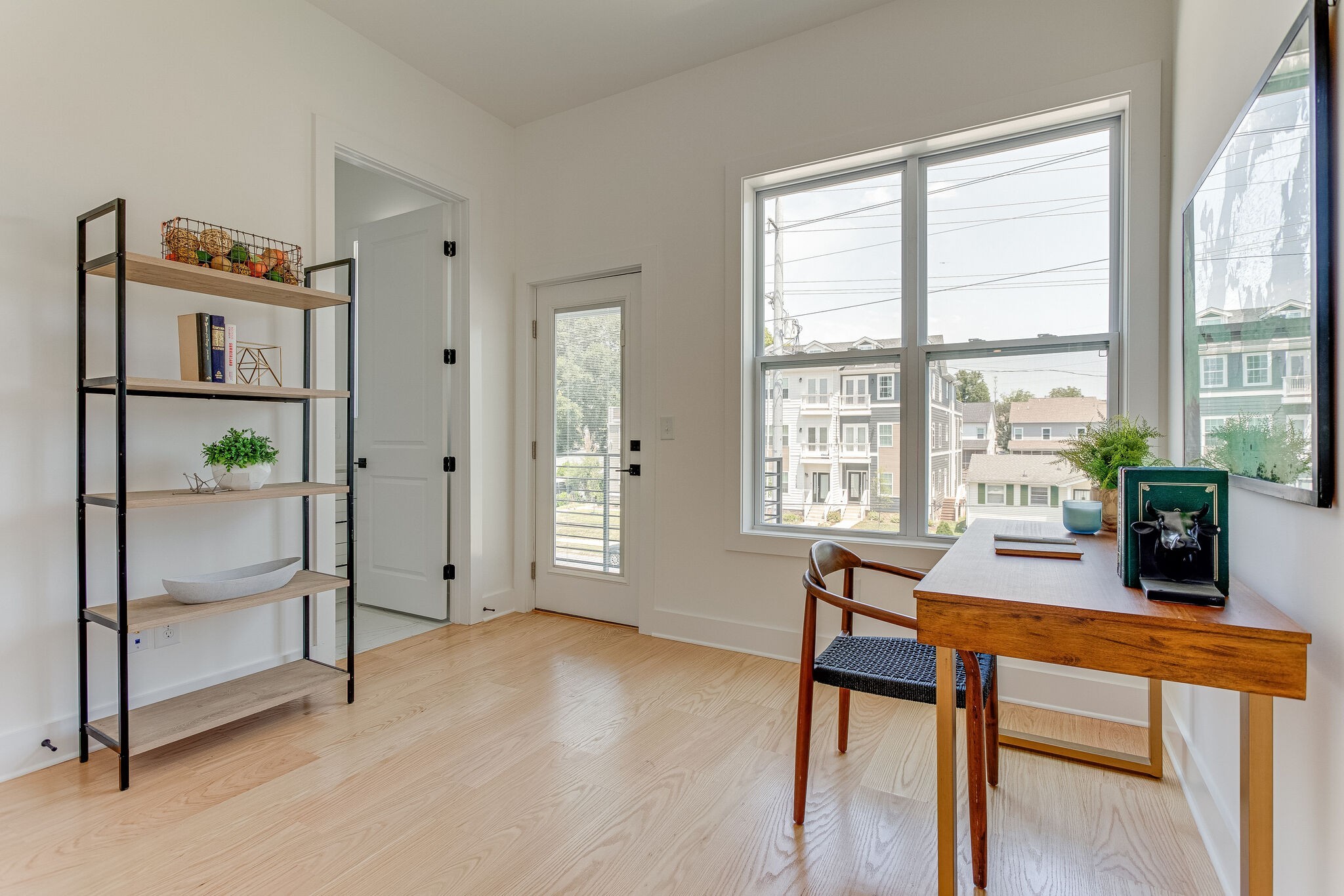 6203 A Morrow Road Nashville, TN 37209 - Photo 9 of 18 a view of a livingroom with furniture window and wooden floor