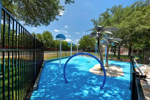 a view of a park with slide